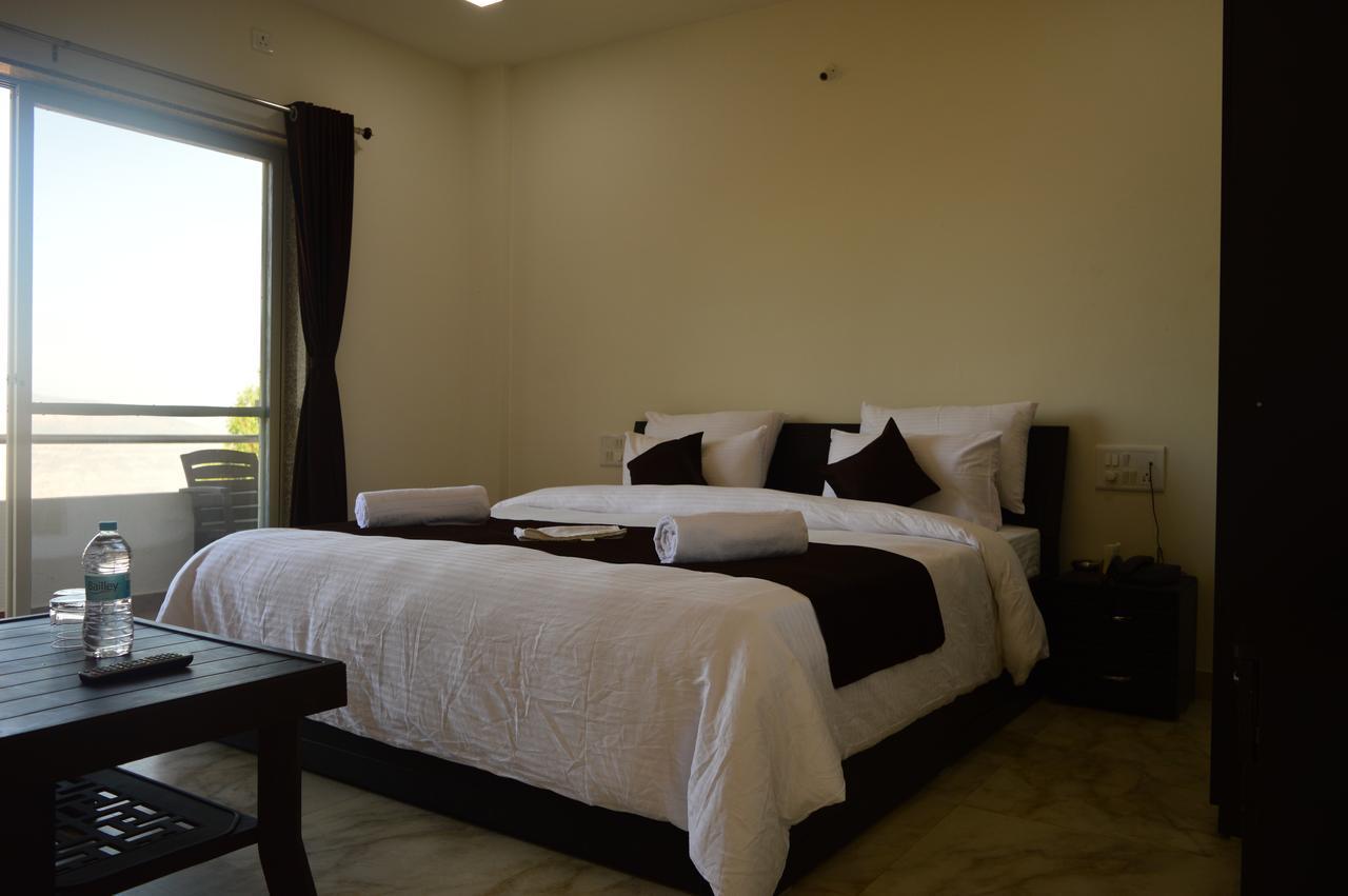 Harmony Palace Hotel มหาบาเลชวาร์ ภายนอก รูปภาพ
