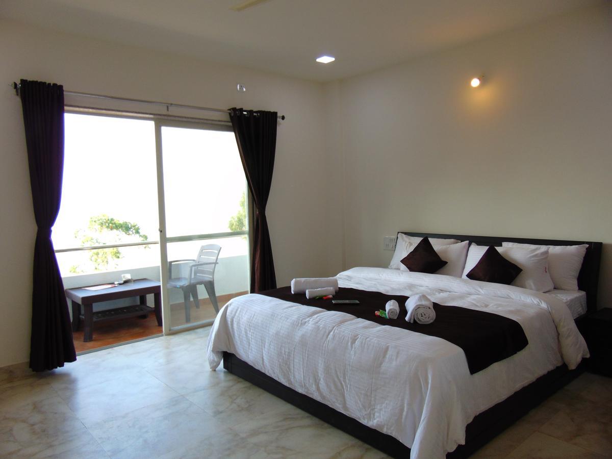 Harmony Palace Hotel มหาบาเลชวาร์ ภายนอก รูปภาพ